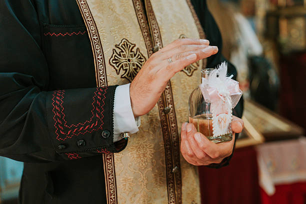 Editorial image of colorful stained glass windows in a Catholic church in Poland, showing traditional Christian art and sacred interior design.