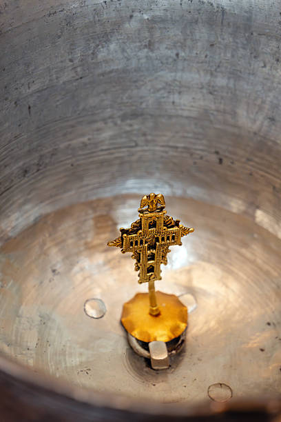 Baptismal Font and the Cross prepared for Christening in Orthodox church