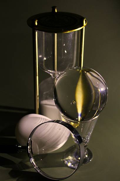 istock Still Life - Glass and spoon with coloured lamp 2244469056