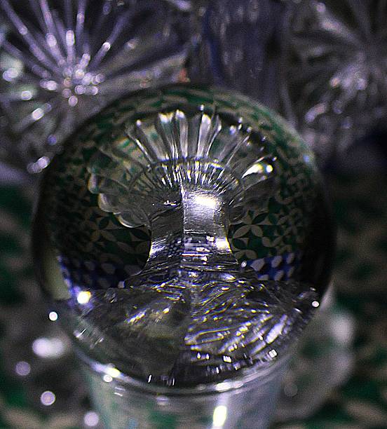 istock Still Life - Glass and spoon with coloured lamp 2244469098