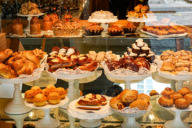 istock A bakery display case with a variety of pastries and cakes 2244469407