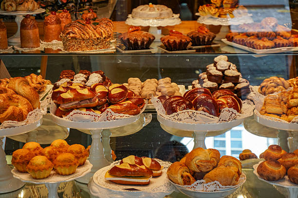 istock A bakery display case with a variety of pastries and cakes 2244469437