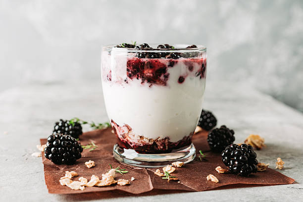 istock Yogurt parfait with granola and blackberry 2244473036
