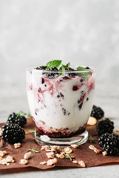 istock Yogurt parfait with granola and blackberry 2244473262