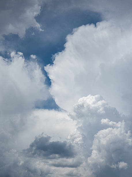 Dramatic clouds over vast blue sky during daytime outdoors