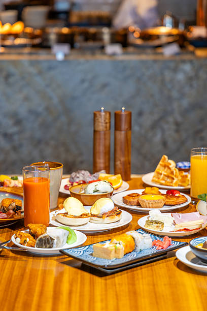 istock Luxurious breakfast buffet with diverse international dishes, juices, 2244483309
