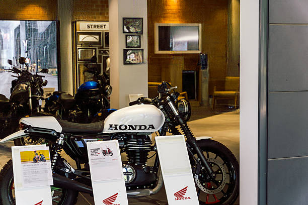 Barcelona, Spain-July 26, 2025. White Honda Motorcycle Displayed in Showroom Interior