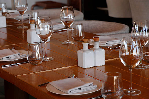 istock hotel restaurant style dining table set up with wine glass and cutlery etc 2244521512