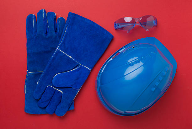 Blue construction equipment on color background, top view