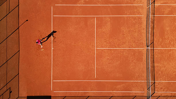 istock Tennis Player Practicing on Clay Court 8 2244535250