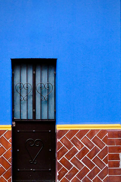 istock Blue Wall with Black Door and Heart Ironwork (Mexico City, Mexico) 2244535437