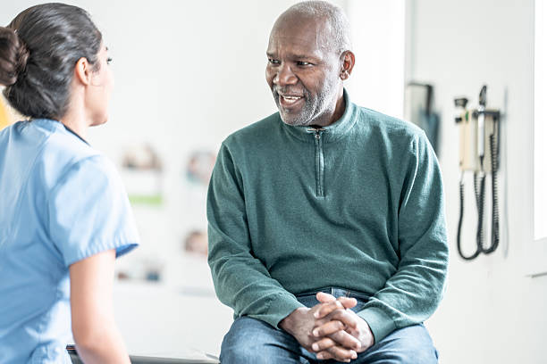 istock Respectful Conversation Between Elder Black Patient And Nurse In Clinic Setting, Warm Interaction 2244535526