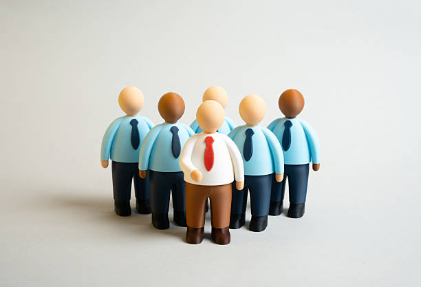 Business team with a manager at the helm. Department. Working human resources. Leadership, coordination, and organizational structure. Business management, corporate hierarchy, team efficiency.