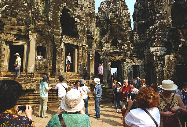 February 22, 2011, Siem Reap, Cambodia - tourists visits the temple complex of Angkor Wat. Bayon Temple at Angkor Thom, Angkor, Cambodia. Siem Reap. Ancient Khmer architecture.