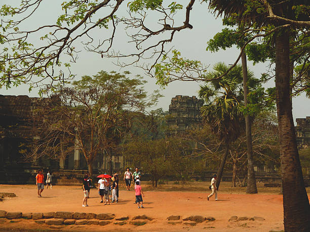 February 22, 2011, Siem Reap, Cambodia - tourists visits the temple complex of Angkor Wat. Bayon Temple at Angkor Thom, Angkor, Cambodia. Siem Reap. Ancient Khmer architecture.