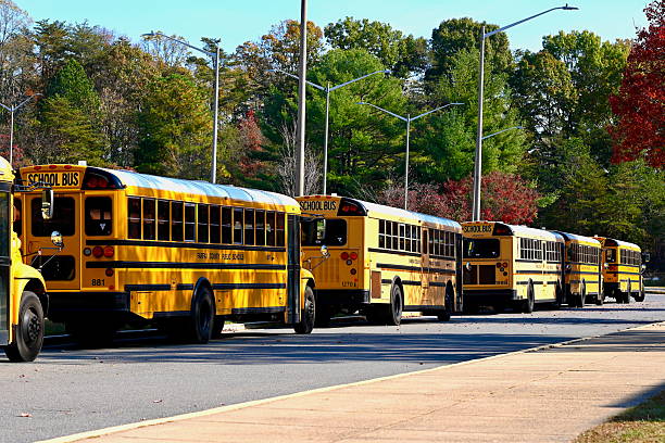 School buses waiting for students in front of Burbank High School, California