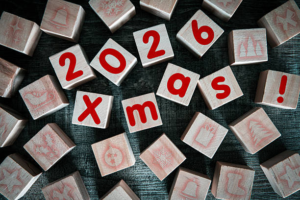 istock Merry Christmas with wood block in 2026 2244553979