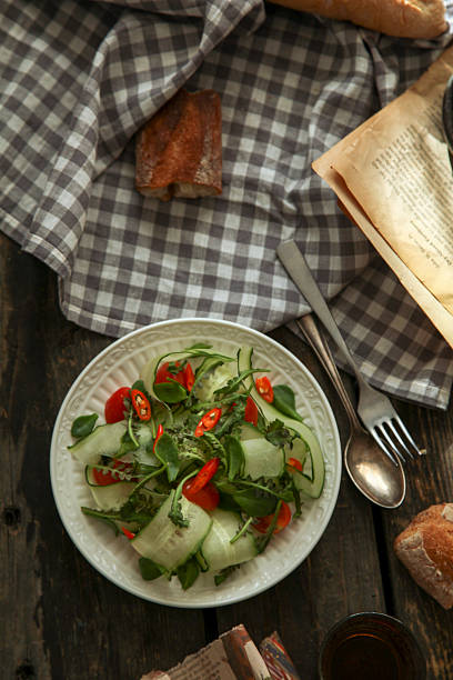 istock Refreshing cucumber salad with fresh herbs and chili peppers 2244555682