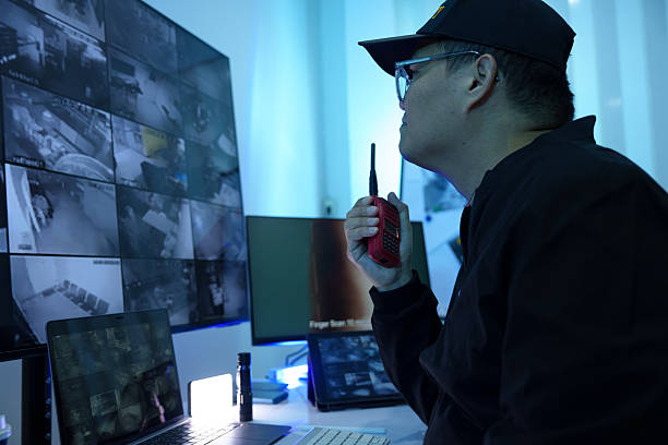 istock Security officers are checking the TV screen of the CCTV system. 2244561686
