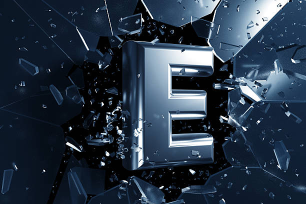 3D rendering of shiny metallic Alphabet E breaking through a glass wall against a dark background, symbolizing achieving success by overcoming challenges with strength and power.