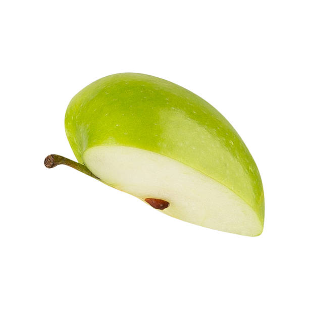 Green Apple slices isolated on white background with clipping path, full depth of field
