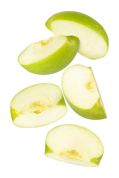 istock Falling Green Apple isolated on white background with clipping path, full depth of field 2244564132