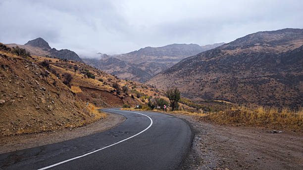 istock Rainy Autumn Mountain Road 2244566724
