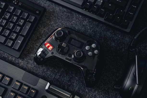 istock A collection of gaming essentials: Various controllers and portable gaming devices neatly arranged on a light gray background. Stock photo highlighting contemporary gaming hardware and modern play 2244567893
