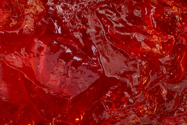 istock Red strawberry Gelatin jelly  structure, abstract culinary red texture 2244569003