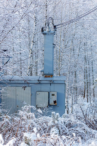 istock A blue building with a chimney and a power box 2244570642