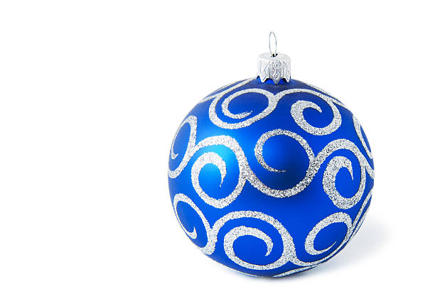 Christmas tree baubles on blue background with white snowflakes. Festive winter holiday background. Design with copy space for greeting card, text, advertising, banner, invitation