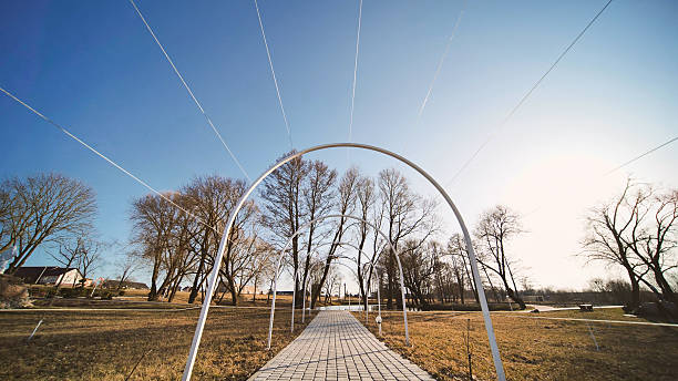 Empty metal arch for grapes and flowers.