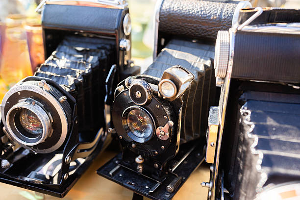 istock Old vintage cameras on stall antiques market. 2244576462