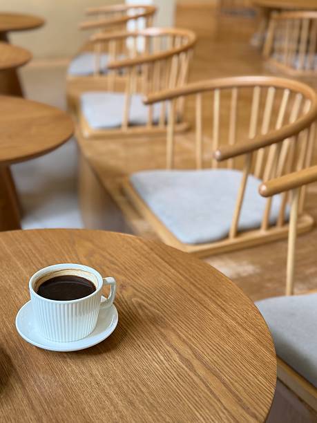 Black coffee on wood table