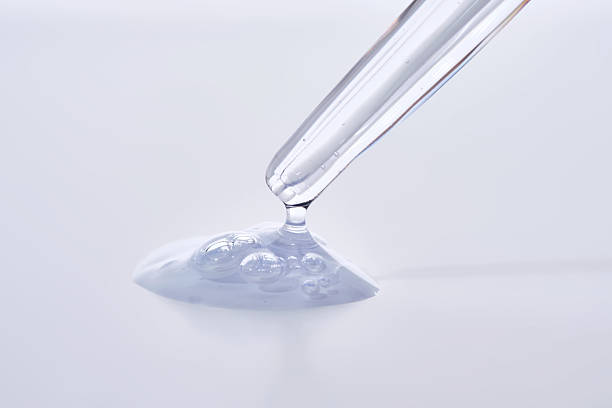 istock Pipette with delicate blue serum close-up. 2244577343