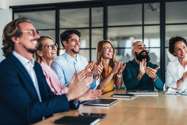 istock Business team applauding success together 2244579772