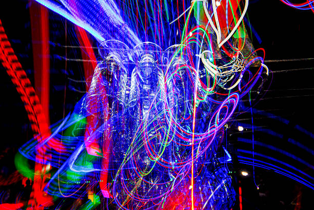 istock Cocktail glasses hanging on the bar 2244580881