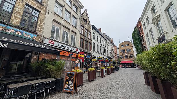 istock A narrow street with restaurants in Antwerp 2244582650