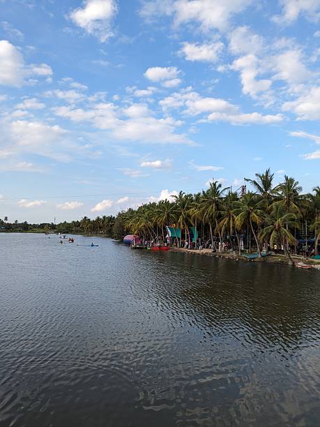 istock palm trees and a sandy beach surround a calm tropical lagoon. 2244589020