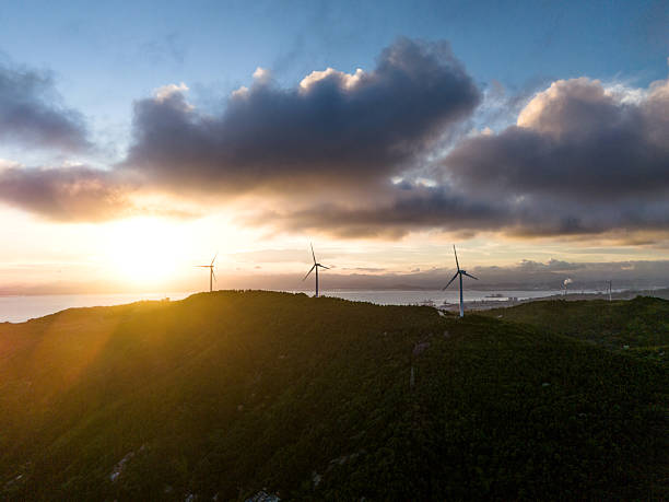 istock Wind Turbines on the mountain peak in the sunset 2244591652