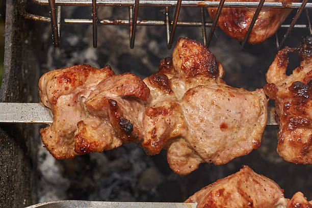 istock Juicy pork barbecue on outdoor grill. 2244592633