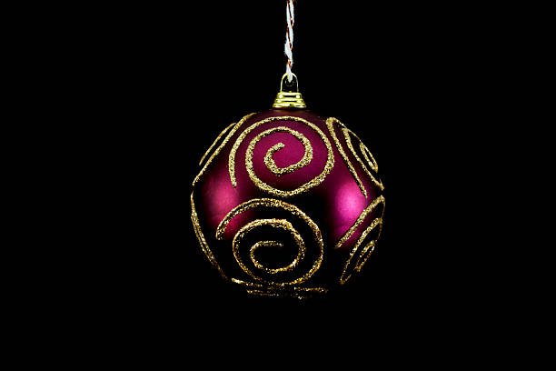 Dark red Christmas ball with gold stripes