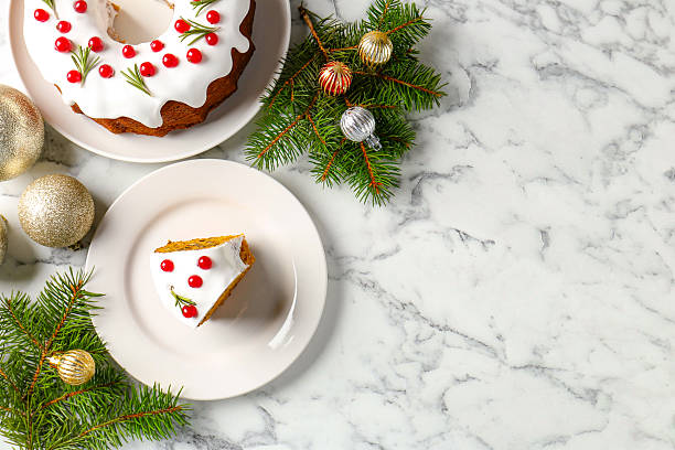 istock Traditional classic Christmas cake and decor on white marble table, flat lay. Space for text 2244603441