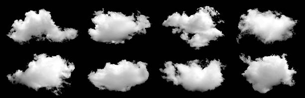 istock Collection of fluffy white clouds isolated on black background, realistic cloud shapes for photo editing, digital design, and sky overlays, natural atmosphere texture for creative artwork. 2244604008