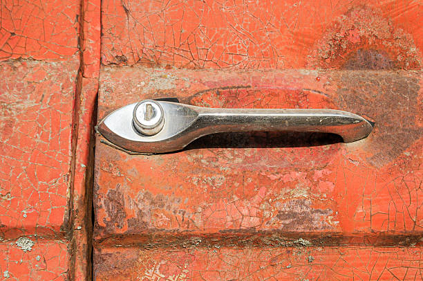 Door handle of old red truck
