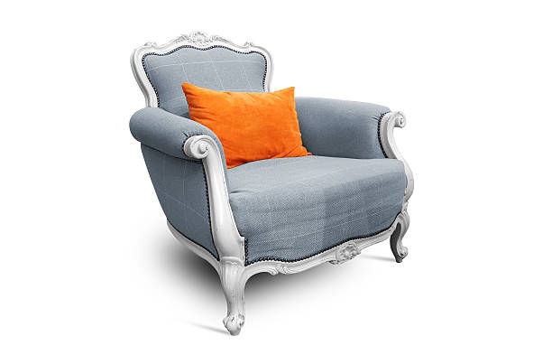 istock Luxurious classic comfortable, wooden armchair with patterned elements, gray fabric and pillow isolated on white background 2244605439