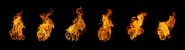 istock Realistic fire flames isolated on black background, perfect for graphic design, motion effects, or digital art. Bright orange flames showing heat, energy, and dynamic movement in high detail. 2244611506