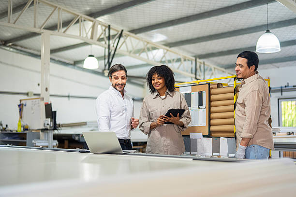 istock Latin factory owner discussing quality control issues with plant managers. 2244611749