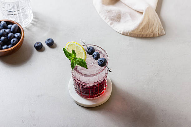 istock Summer fresh blueberry cocktail with ice, lemon and mint 2244617328