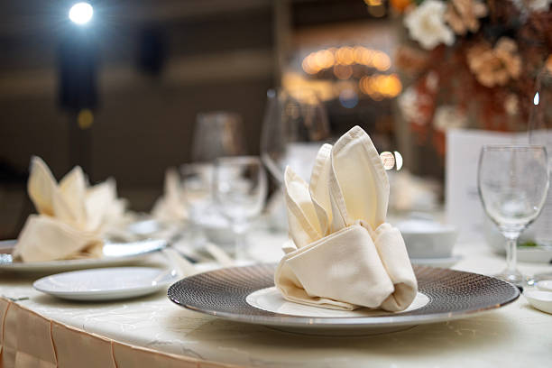 istock Elegant Banquet Table Setting with Glassware and Napkin Arrangement 2244621842